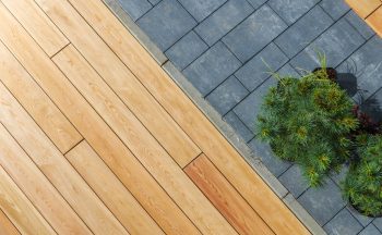 wood-deck-and-concrete-bricks-pavement-in-a-garden-2022-12-16-11-52-40-utc